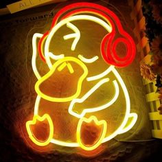 a neon sign with a cartoon character on it