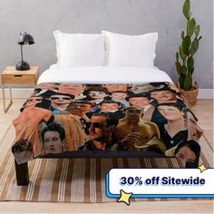 a bed with a bunch of pictures on it and the words 30 % off sitting next to each other