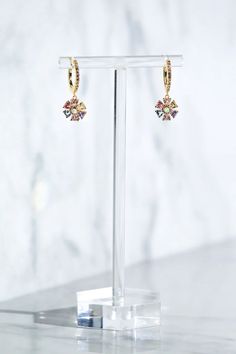 These stunning 14K gold vermeil huggie earrings feature a vibrant and colorful floral design with sparkling multi gemstones and cubic zirconia. Elevate any outfit with these unique and eye-catching earrings. Crafted with high-quality materials for a luxurious touch. Blue Hawaiian, Turquoise Rings, Huggie Earrings, Moonstone Ring, Huggies Earrings, Gold Vermeil, Moonstone, Cubic Zirconia, Floral Design