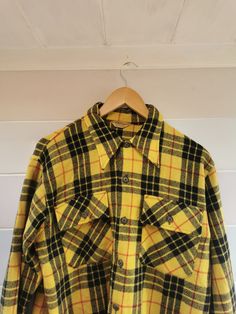 ~Rare 1950s Pilgrim Flannel ~True vintage ~100% cotton  ~Warm yellow and black tartan check ~In very good vintage condition.  A small mark on the front and a very small hole at the back (pictured) ~Measurements 27.5 length  22 inches pit to pit Estimated UK large Vintage Plaid Cotton Flannel Shirt, Vintage Plaid Flannel Shirt With Pockets, Vintage Collared Flannel Shirt For Winter, Vintage Plaid Collared Outerwear, Retro Collared Flannel Shirt, Vintage Plaid Flannel Shirt With Button Closure, Vintage Flannel Shirt With Pockets, Retro Plaid Flannel Shirt With Buttons, Vintage Collared Flannel Shirt For Fall