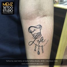 a tattoo on the arm of a person with a knife and fork in it's hand