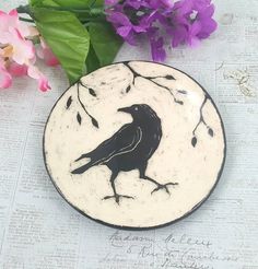 Check out this item in my Etsy shop https://www.etsy.com/listing/827960478/raven-or-crow-bird-sgraffito-ceramic Raven Pottery Mug, Clay Sgraffito Plate, Dove Plate Pottery, Crow Pottery Mug, Sgraffito Bird Plate, Bird Pottery, Clay Turtle, Ceramic Wall Sculpture, Sgraffito Technique