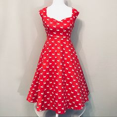 Sweet Graceful Swans On A Deep Coral Background. Vintage 50’s Style Sweetheart Neckline And Retro Bow At Waist Make This Rockabilly Dreamboat Dress Pop. Waist Measures 13” Flat, 15.5” Flat Across Bust With Some Stretch To The Dress. Dress Is 97% Cotton And 3% Elastane. Lining Is 95%Polyester And 3% Elastane. Dress Looks More Bright Pink Like In The Stock Photos Than The Red My Camera Kept Picking Up. I Removed The Bow, So There Is A Small Mark Where The Bow Once Was But I Think It Looks A Bit Mo Fitted Cotton Midi Dress In Retro Style, Fitted Retro Cotton Midi Dress, Retro Fitted Cotton Midi Dress, Retro Dress With Sweetheart Neckline For Spring, Sleeveless Heart Print Dresses For Spring, Cute Fitted Midi Dress, Heart Print Sleeveless Dress For Spring, Fitted Heart Print Dress For Spring, Pink Daywear Dresses With Bow