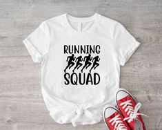 Running Squad T-Shirt, Runner Marathon Gift, Running Shirt, Running Track Team T-Shirt, Sports Gift Tee, Love Running Shirt, Runner Cute Tee. How Do I Order 1) Before you place the order, please review all the information. 2) From the drop down menu, chose your shirt type and size. 3) From the drop down menu, chose the color of the shirt. 4) If you need more items, add the item you like in the cart first then click the back button and follow the steps 1-4 again. Washing Wash the inside of the t-shirts in cold water, do not bleach, do not dry clean, do not iron directly on the design 🙏Thank You For Supporting Our Small Business🙏  Note: Product and design color may slightly vary due to photographic lighting sources or your monitor settings. Team Shirt Designs, Marathon Gift, Track Team, Running Team, Business Notes, Running Track, Team T Shirts, Running Shirts, Team Shirts