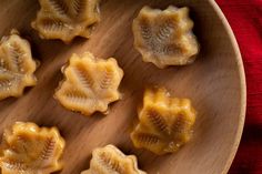 some kind of food that is on a wooden plate