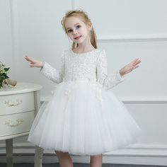 Couture Flower Girl Dresses White Spring Tutus Flower Girl Dress Tulle Long Sleeves For Winter Weddings #TG7037 at GemGrace. View more special Flower Girl Dresses now? #GemGrace To buy delicate gowns at affordable prices. Over 399 new styles added, shop now to get $5 off! White Tulle Ball Gown For Dress-up, White Ball Gown With Tulle Skirt For Dress-up, Long Sleeve Tulle Tutu Dress For Pageants, Long Sleeve Tulle Princess Dress For First Communion, Long Sleeve Princess Dress With Tulle Skirt For Wedding, White Long Sleeve Gown For Dress-up, White Long Sleeve Formal Gown, Long Sleeve Tulle First Communion Dress, Fitted Long Sleeve Tulle Baptism Dress