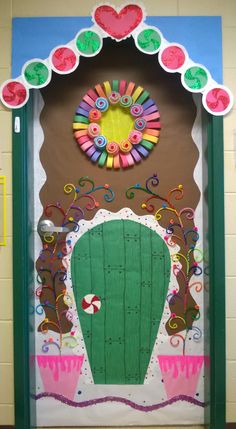 a door decorated with paper flowers and decorations