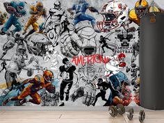 a wall mural with football players and helmets on it, next to a pair of dumbbells