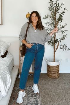 Love these jeans! Super flattering and comfortable. Im wearing a size 29 and usually an 8/10 so they fot tts for me!   Mom jeans, jeans outfit, fall outfit, mom outfit, midsize Cool Mom Outfits Fall 2024, Manila Outfit, Easy Mom Style, Mum Uniform, Curvy Fall Outfits, Midsize Fall Outfits, Jeans And Sneakers Outfit, Wardrobe Necessities, Finding Style