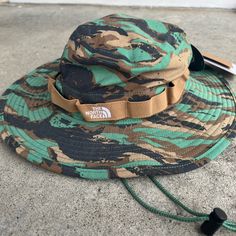 Nwt The North Face Class V Brimmer Bucket Hat In Grass Camo Print - Size - S/M Floppy Bucket Hat By The North Face Fitted With An Adjustable Drawcord. - Nylon - Spot Clean - Imported Casual The North Face Hats For Hiking, Casual The North Face Hats For Travel, The North Face Summer Hats For Outdoor Activities, The North Face Curved Brim Hats For Summer, Casual The North Face Hat For Outdoor Activities, Casual The North Face Hats For Outdoor, Khaki Wide Brim Bucket Hat For Hiking, Khaki Brimmed Hat For Hiking, Casual Khaki Bucket Hat For Hiking