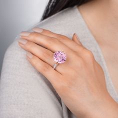 Gorgeous pink kunzite measuring 17mm round by 12mm deep set in 18k rose gold with white F-VS diamonds on the shank. .8 total carat diamond weight Made to order Luxury Pink Topaz Ring, Luxury Pink Topaz Ring With Diamond, Luxury Pink Topaz Round Ring, Luxury Pink Amethyst Ring With Accent Stones, Luxury Pink Topaz Ring With Center Stone, Luxury Pink Amethyst Ring With Prong Setting, Luxury Pink Amethyst Wedding Ring, Pink Amethyst Diamond Ring, Pink Amethyst Ring With Brilliant Cut