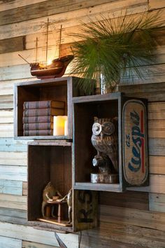 an old wooden shelf with books and other items on it