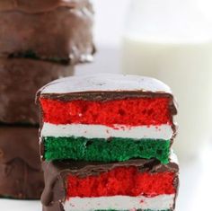 three pieces of chocolate cake with the flag of italy on top