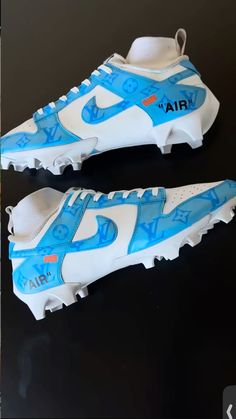 a pair of sneakers with the word air painted on them