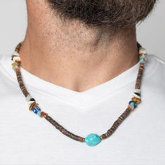 Stony Survivor Multi Threaded Along An Invisible Wire, Brown Wooden Beads, A Chiseled Collection Of Multicolored Natural Stones, And Brass-Colored Fittings Haphazardly Coalesce Down The Neckline To Meet An Oversized, Geometric Turquoise-Colored Stone At Its Center. Tiger's Eye And Lapis Stones Intermingle With Reflective And Marbled Stones Within The Stony Collection For An Earthy Finish. Features An Adjustable Clasp Closure. As The Stone Elements In This Piece Are Natural, Some Color Variation Artisan Brown Beaded Necklace For Beach, Brown Polished Beads For Beach, Brown Gemstone Beads Necklace For Beach, Brown Gemstone Beads For Festival, Brown Beaded Necklaces With Natural Stones For Beach, Brown Beaded Necklace With Natural Stones For Beach, Lava Rock Bracelet, Natural Stone Necklace, Genuine Leather Bracelet