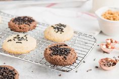 some cookies are cooling on a wire rack