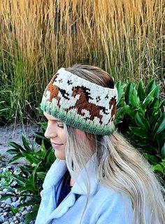 a woman wearing a knitted headband with horses on it