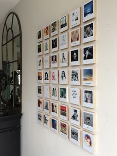 a wall with many different pictures on it