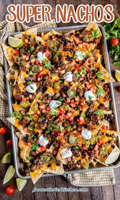 an overhead view of a tray of nachos with the title above it