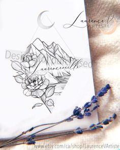 the back side of an envelope with flowers and mountains on it, surrounded by lavenders