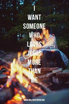 a man and woman sitting next to a campfire with the words i want someone who loves jesus more than me