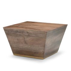 a wooden box sitting on top of a white surface