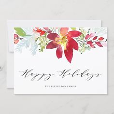 a holiday card with watercolor flowers on it