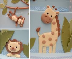 the cake is decorated like a giraffe, monkey and leafy tree branches