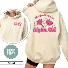 Celebrate your sisterhood in style with our Alpha Chi Omega Sorority Sweatshirt! Perfect for cozying up on a chilly day or showing off your sorority pride. 𝐐𝐔𝐈𝐂𝐊 𝐒𝐈𝐙𝐈𝐍𝐆 𝐓𝐈𝐏 Printed on premium Gildan Heavy Blend™ sweatshirts and hoodies, these pieces run true to size. Consider sizing up for a more oversized, cozy fit. We 100% recommend checking the size chart for dimensions before ordering. * * * * * * * * * * * * * * * * * * * * * * * * * * * * * 𝐏𝐑𝐎𝐃𝐔𝐂𝐓𝐈𝐎𝐍 & 𝐒𝐇𝐈𝐏𝐏𝐈 Little Gifts Sorority, Alpha Phi Sorority, Bid Day Gifts, Sigma Delta Tau, Theta Phi Alpha, Delta Sorority, Sorority Sweatshirts, Alpha Sigma Tau, Phi Sigma Sigma