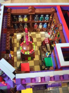 an overhead view of a toy store with lots of toys on the table and shelves