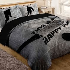 this is an image of a hockey comforter set with the words happy new year on it