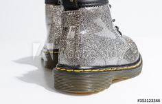 london, england, 05/05/2019 Dr Martens toddler infants silver glitter Leather doc martens baby Boots, 4 Eye lace hole. fashionable punk historic british made leather boots. dr martens air ware #AD , #glitter, #silver, #infants, #martens, #doc Leather Doc Martens, Baby Boots, Doc Martens, Silver Glitter, Infants, Dr. Martens, London England, Leather Boots