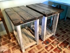 two wooden tables sitting on top of a tiled floor