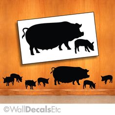 the silhouettes of farm animals are displayed on a wall