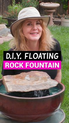 a woman wearing a hat sitting in front of a rock fountain with the words diy floating rock fountain