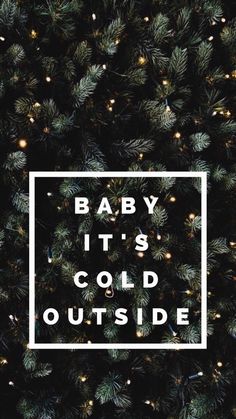 a christmas tree with the words baby it's cold outside