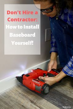 a woman working on a baseboard with a cordless drill and screwdriver