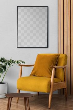 a living room with a yellow chair and a wooden coffee table in front of it