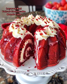 red velvet cheesecake bundt cake with white frosting