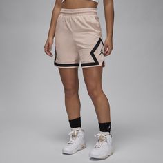 Lessons we all learned from MJ: hoop with your gold chains on, and make sure your gear is as strong as your crossover. Designed for sport as much as they are for style, these shorts feature a 6-inch inseam, breathable mesh with sweat-wicking tech, and a rollable waistband with an internal drawcord. Baige Nike Shorts, Diamond Shorts, Basketball Gear, Women's Basketball, Women Lifestyle, Womens Basketball, Women Diamond, Michael Jordan, Nike Dri Fit