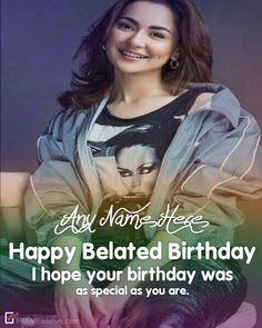 a woman sitting on top of a couch with a happy birthday message in front of her