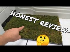 a person pointing to the ground with an emoticive message on it that reads honest review