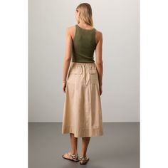 Beige cotton (100% Cotton). Skirt. Pull-on closure. 31.5" from shoulder to hemline. Imported. Asymmetrical Cotton Skirt In Beige, Beige Cotton Asymmetrical Skirt, Beige Asymmetrical Cotton Skirt, Chic Summer Midi Cargo Skirt, Chic Cotton Cargo Skirt For Spring, Long Cotton Cargo Skirt With Lining, Spring Cotton Asymmetrical Cargo Skirt, Cotton Long Cargo Skirt With Lining, Summer Cotton Midi Cargo Skirt