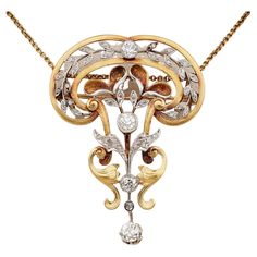 This impressive Art Nouveau Diamond brooch pendant is 1890 ca Sensual, sinuous lines expertly carved from rich 18 KT gold, contrasted by Platinum portions, make this brooch pendant quite an unique and distinctive example This antique work of art has been adorned by 2.65 Ct of Diamonds in total 1 old mine cut diamond of approx .60 Ct (G/VVS) – 3 old mine cut diamonds totalling approx 1.25 Ct (G/H-VS/SI) – 39 rose cut Diamonds totalling approx .80 Ct (by spread) It can be worn as brooch or pendant Victorian Pendant Necklace, Art Deco Pendant Necklace, Art Nouveau Pendant, Victorian Pendants, Nouveau Jewelry, Edwardian Jewelry, Art Deco Pendant, Wire Work Jewelry, Art Nouveau Jewelry