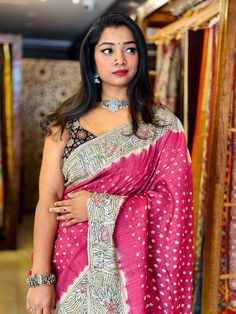 Absolutely Gorgeous Red colored Hand Knotted BANDHANI on Tussar Silk Saree with 100% hand embroidered Needle KANTHA Thread work.A very classy Jaal work on Pallu in olorful Threads. A beautiful Hand embroided thread work on the Blouse for Sleeves. Saree comes with decent Finishing and Fall & Pico with Piping on edges. Note: Minor color differences possible due to light and camera settings   Note: This saree is made out of Organic Tussar Silk , minor inconsistencies can be expected and these are n Elegant Blouse Designs, Kantha Work, Tussar Silk Saree, Work Sarees, Camera Settings, Thread Work, Beautiful Hand, Silk Saree, Blouse Designs