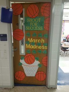 a door decorated with basketballs and the words shoot for success