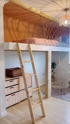 there is a loft bed with a ladder on the bottom and a hammock hanging from the ceiling