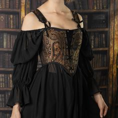 This black paisley corset is a timeless classic for Renaissance Faires. Swirls of gold, orange, and grey heavily decorate this jacquard fabric in an intricately woven paisley pattern. Our High Back Renaissance Bodice is inspired by historical corsets and bodices of yore. Reinforced with more boning than our classic Renaissance Bodices, and complete with both front and back lacing for an extra adjustable fit, this corset is sure to be a staple in your Renaissance Festival wardrobe. Luxury Corset Dress With Historical Design And Fitted Bodice, Renfest Costume Women Corset, Luxury Black Corset Dress For Costume, Luxury Overbust Bodice For Night Out, Luxury Black Costume For Larp, Luxury Medieval Corset With Historical Design, Luxury Lined Overbust Bodice, Ren Faire Witch Suits, The Musketeers Constance