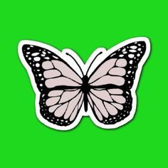 a white and black butterfly sticker on a green background with space for the text