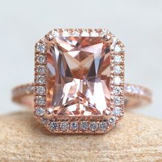 This classic, handmade Radiant Morganite Halo Ring begins with a stunning, genuine AAA morganite. This is part of our Helena Collection, which features a halo of diamonds around the center stone and half-way down the shank, as well as under the main stone to give you sparkle from every angle! A cathedral shank raises the center stone so that a matching wedding band can sit flush. Center stone: AAA Peachy-Pink Morganite, Radiant Cut, average 10x8mm and 3.50 carats. Side stones: 68 natural, white Mason Ryder, Morganite Halo Ring, Pink Engagement, Cathedral Ring, Morganite Pendant, Full Eternity Ring, Morganite Engagement, Pink Morganite, The Cathedral